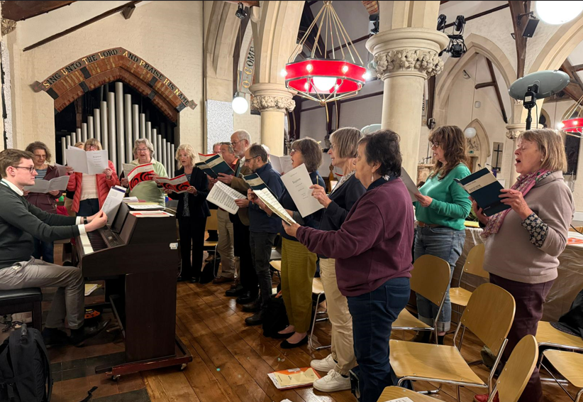 Photo5_NEW_choir_rehearsing.png