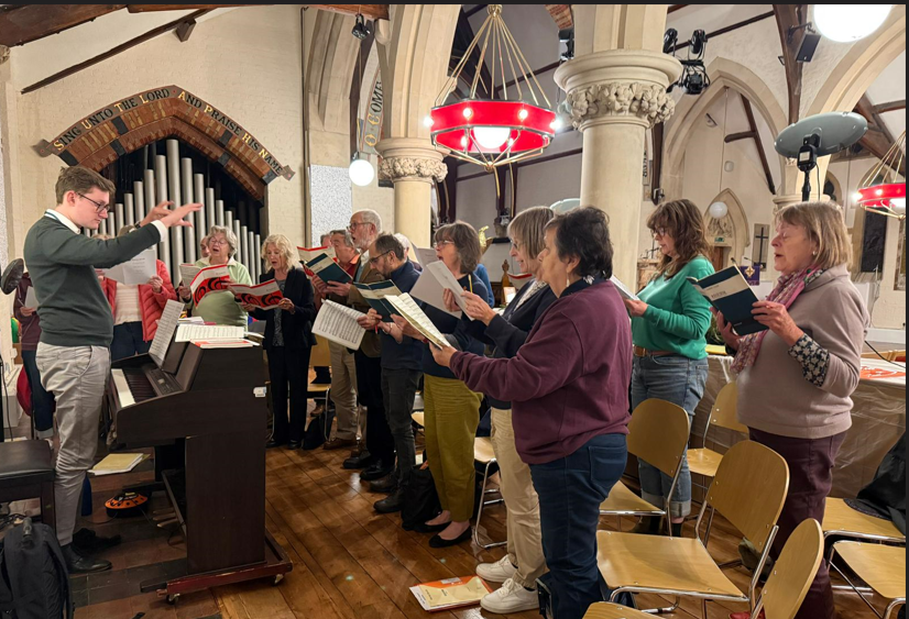 Photo3NEW_choir_rehearsing.png